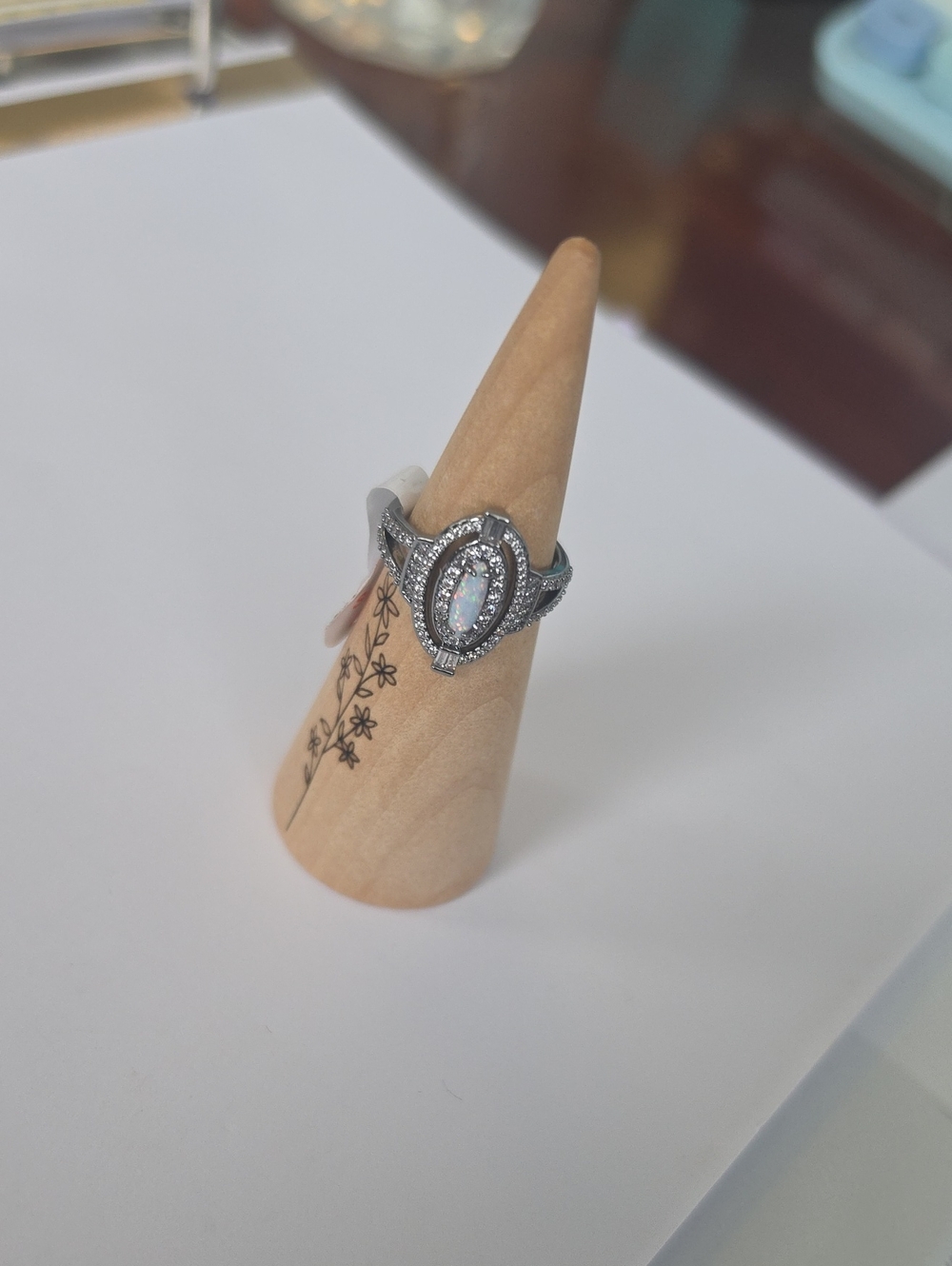 BP_"A Map Of Her Light" Hematite Opal Halo Teardrop Ring - White Opal